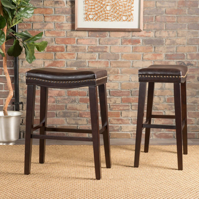 GDFStudio GDF Studio Cavalia Saddle Shaped Studded Rim Stool, Set Of 2, Brown 1 GDFStudio GDF Studio Cavalia Saddle Shaped Studded Rim Stool, Set Of 2, Brown